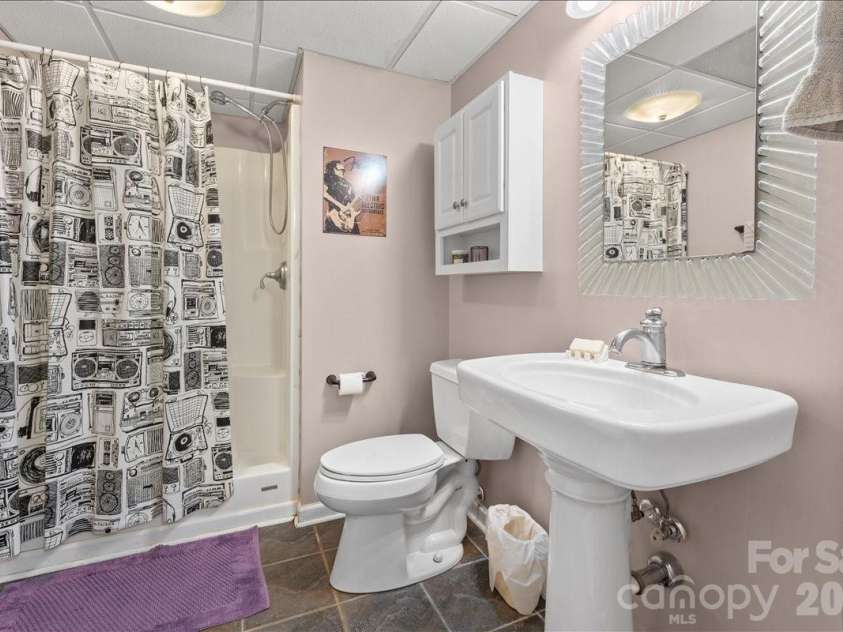 104 Balsam Circle, Troy, NC 27371.  MLS# CAR4394783, YatesRealty ID 31500. Downstairs full bath.