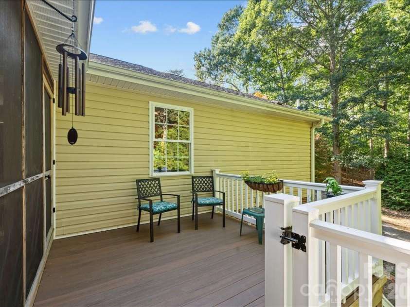 104 Balsam Circle, Troy, NC 27371.  MLS# CAR4394783, YatesRealty ID 31500. The grilling deck has vinyl railings and composite decking for easy maintenance.