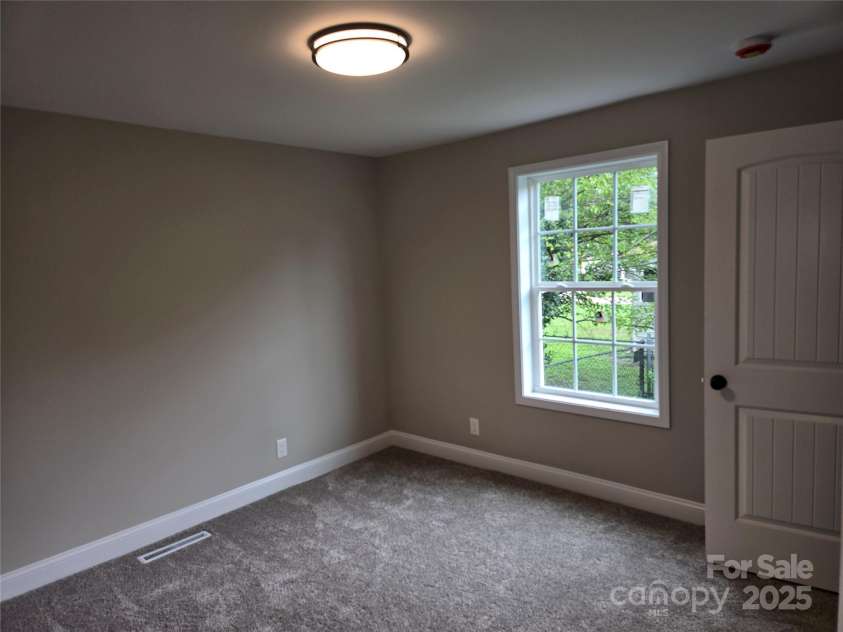 107 21st Street, Kannapolis, NC 28081.  MLS# CAR4290639, YatesRealty ID 31505. Middle Bedroom