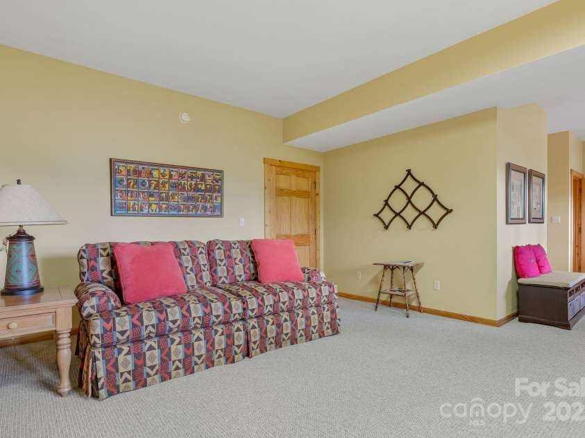 90 Forest Ridge Road, Burnsville, NC 28714.  MLS# CAR4176437, YatesRealty ID 3151. Basement Family Room 