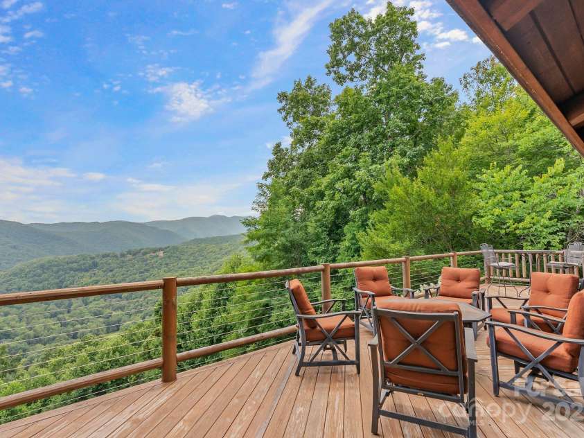 90 Forest Ridge Road, Burnsville, NC 28714.  MLS# CAR4176437, YatesRealty ID 3151. Deck with Spectacular Views 