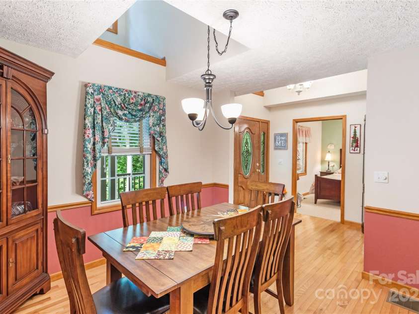 93 Hickory Drive, Maggie Valley, NC 28751.  MLS# CAR4290605, YatesRealty ID 31510. Dedicated dining room