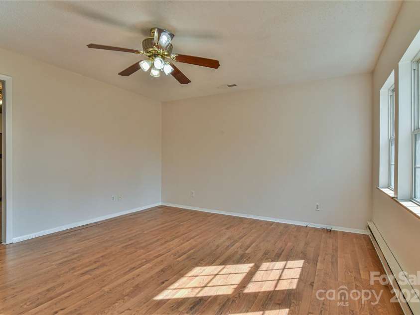 12 Moody Street, Candler, NC 28715.  MLS# CAR4289660, YatesRealty ID 31529. Living room