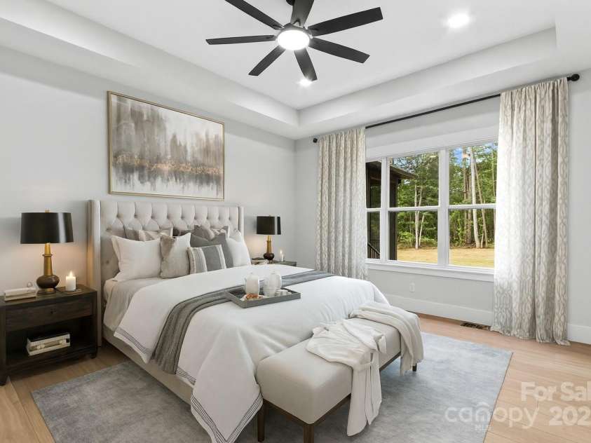 1075 Lake Wright Road, China Grove, NC 28023.  MLS# CAR4278354, YatesRealty ID 31532. Main Bedroom is large with natural light & tray ceiling.