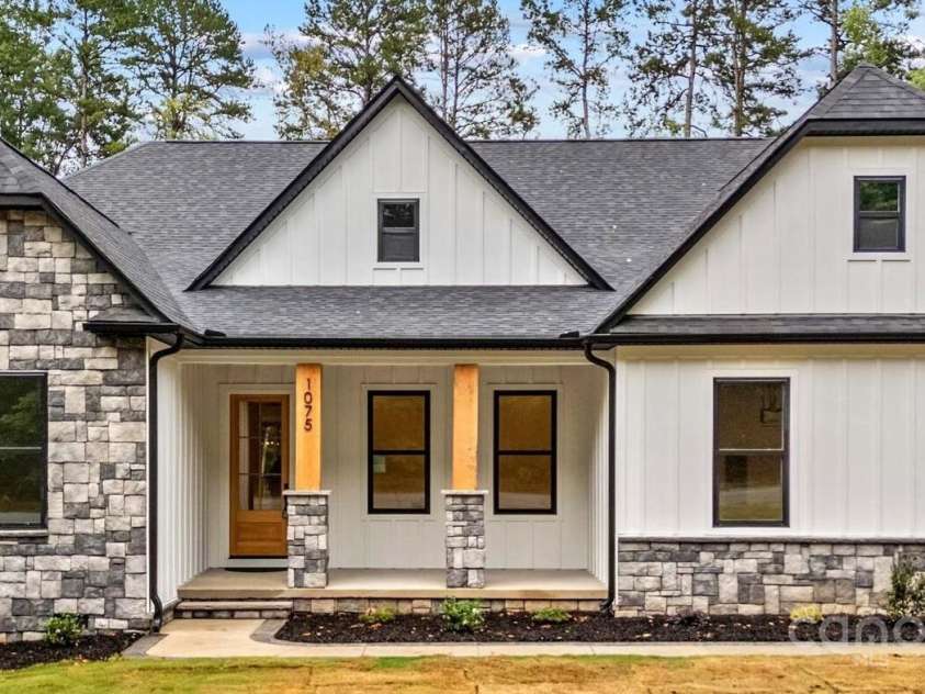 1075 Lake Wright Road, China Grove, NC 28023.  MLS# CAR4278354, YatesRealty ID 31532. Welcome to the dream home of 2025! Envisioned & built by a real estate developer with over 20 years experience.