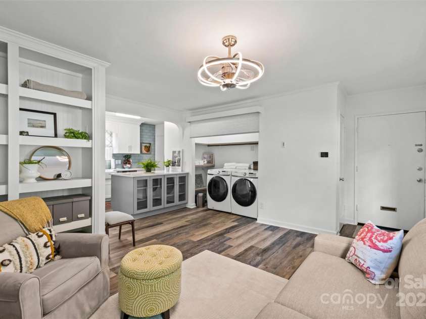 301 Wakefield Drive, Charlotte, NC 28209.  MLS# CAR4285273, YatesRealty ID 31534. Living room featuring built in shelving