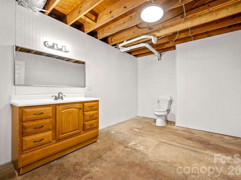 5732 Nc 9 Highway, Tryon, NC 28782.  MLS# CAR4395591, YatesRealty ID 31544. Basement half bath