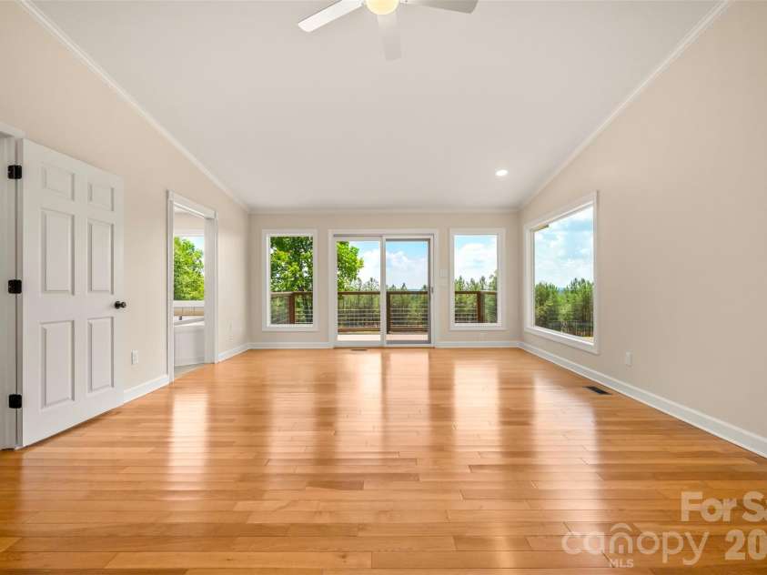 5732 Nc 9 Highway, Tryon, NC 28782.  MLS# CAR4395591, YatesRealty ID 31544. Cathedral ceilings in main bedroom