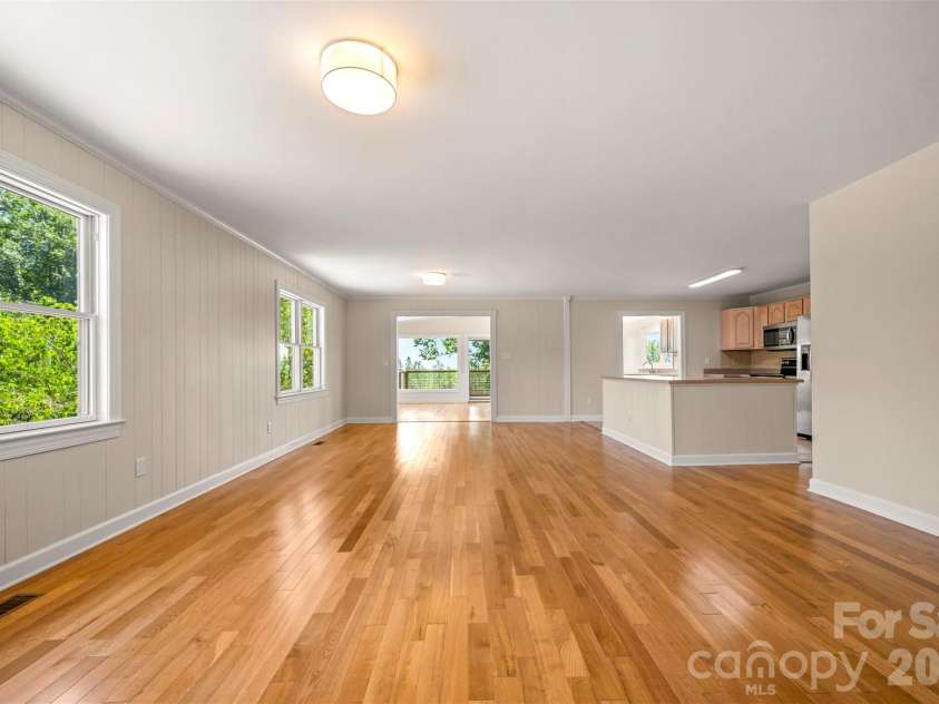 5732 Nc 9 Highway, Tryon, NC 28782.  MLS# CAR4395591, YatesRealty ID 31544. Living room