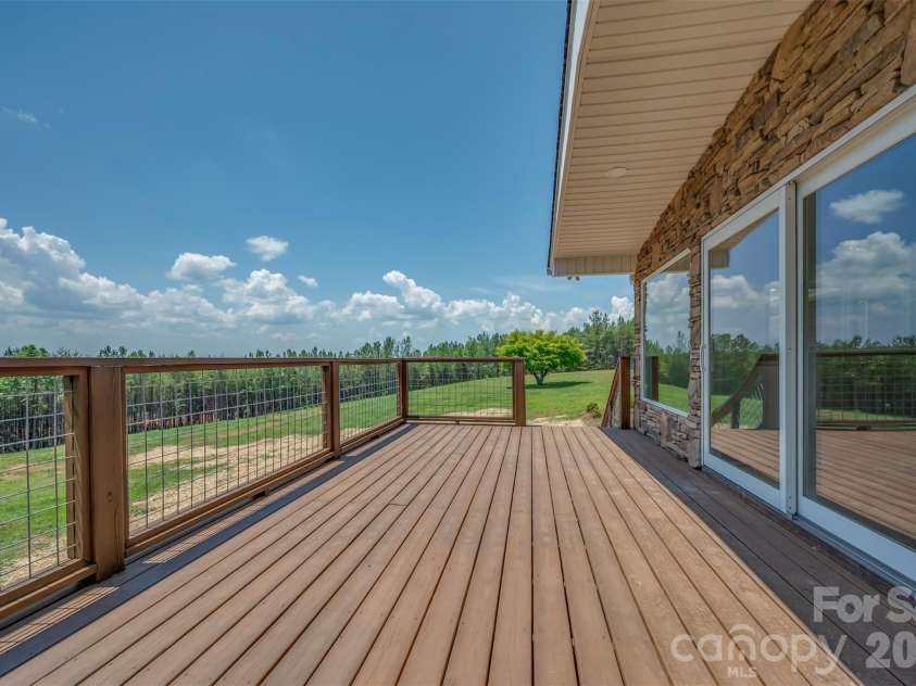 5732 Nc 9 Highway, Tryon, NC 28782.  MLS# CAR4395591, YatesRealty ID 31544. New back deck