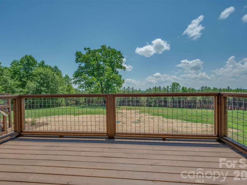 5732 Nc 9 Highway, Tryon, NC 28782.  MLS# CAR4395591, YatesRealty ID 31544. New deck off the bedroom