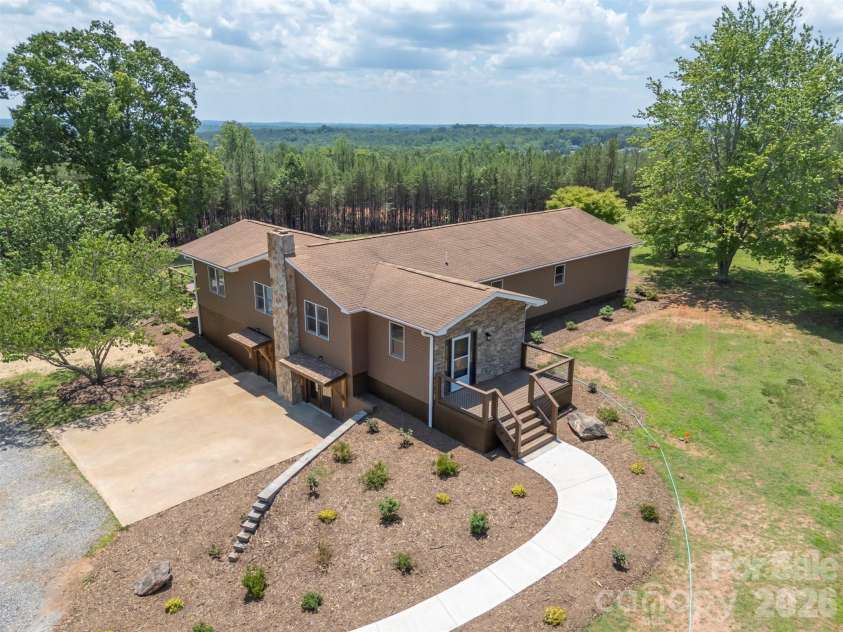 5732 Nc 9 Highway, Tryon, NC 28782.  MLS# CAR4395591, YatesRealty ID 31544. New landscaping