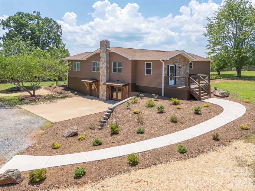 5732 Nc 9 Highway, Tryon, NC 28782.  MLS# CAR4395591, YatesRealty ID 31544. New landscaping