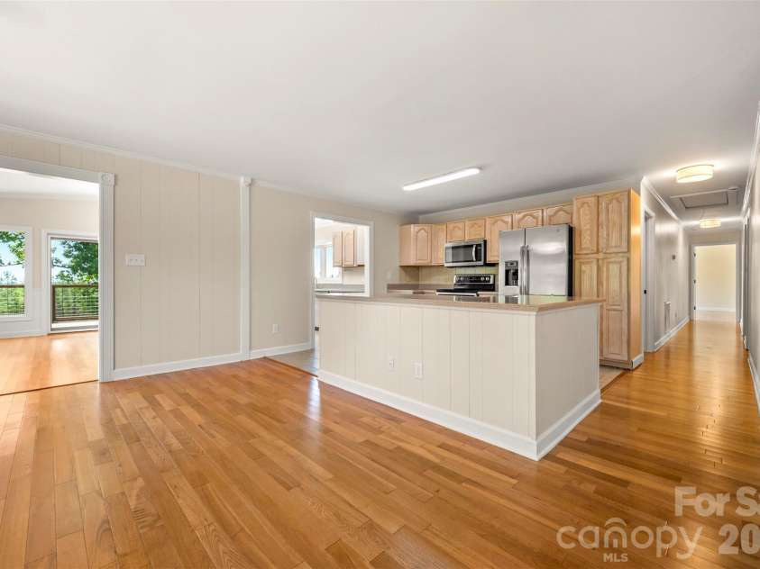 5732 Nc 9 Highway, Tryon, NC 28782.  MLS# CAR4395591, YatesRealty ID 31544. Open concept living/ kitchen area