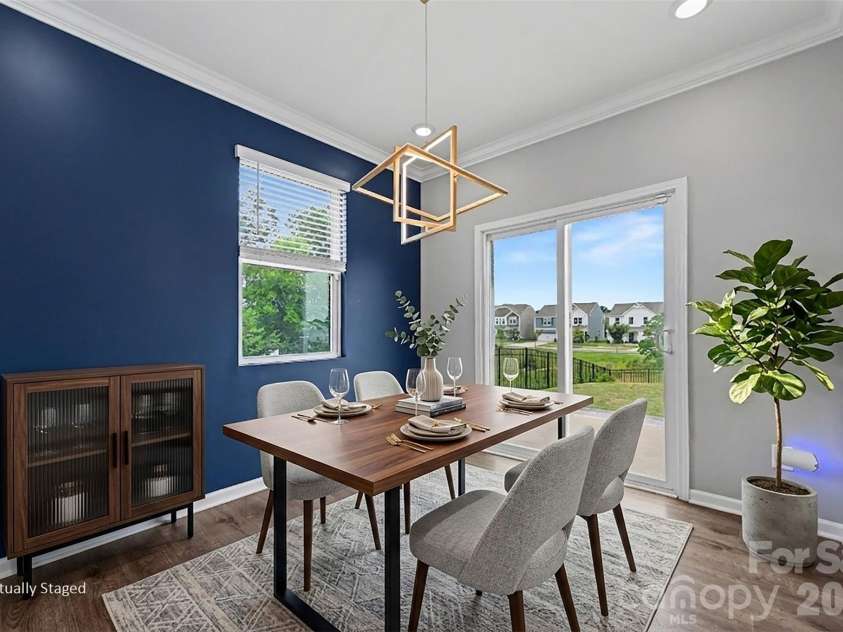 1448 Harleston Street, Indian Trail, NC 28079.  MLS# CAR4395691, YatesRealty ID 31552. Virtually staged dining room