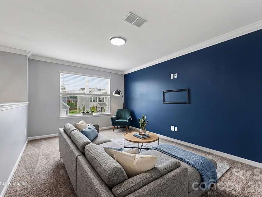 1448 Harleston Street, Indian Trail, NC 28079.  MLS# CAR4395691, YatesRealty ID 31552. Virtually staged loft