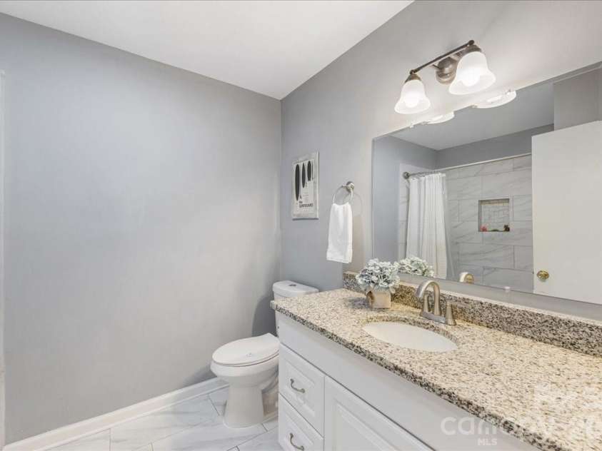 4914 Glenbrier Drive, Charlotte, NC 28212.  MLS# CAR4384998, YatesRealty ID 31554. Shared bathroom in hall