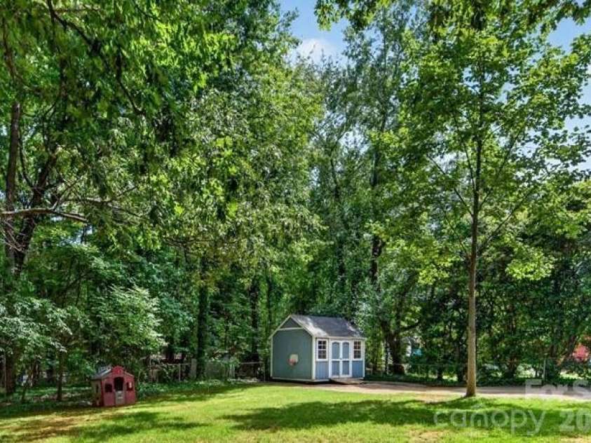 4914 Glenbrier Drive, Charlotte, NC 28212.  MLS# CAR4384998, YatesRealty ID 31554. Storage shed for tools or toys