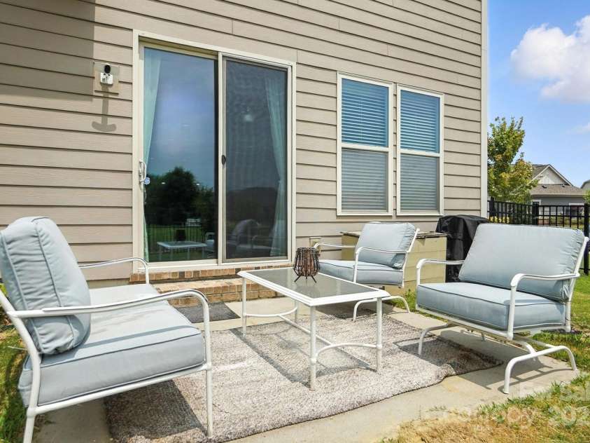 2026 Union Grove Lane, Indian Trail, NC 28079.  MLS# CAR4278119, YatesRealty ID 31555. Back Patio - Fenced Yard