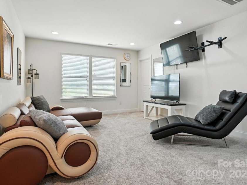 2026 Union Grove Lane, Indian Trail, NC 28079.  MLS# CAR4278119, YatesRealty ID 31555. Loft - New Carpet