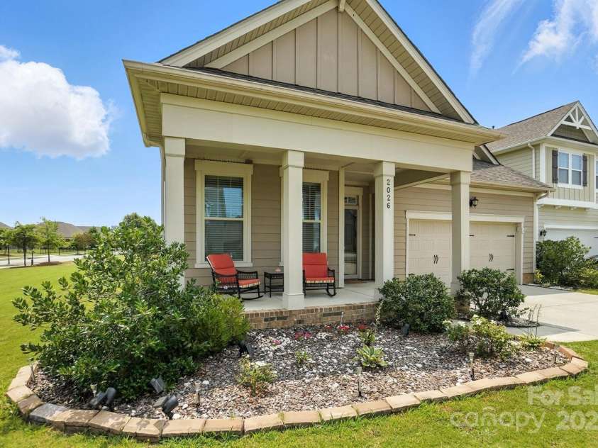 2026 Union Grove Lane, Indian Trail, NC 28079.  MLS# CAR4278119, YatesRealty ID 31555. Side Vide of Home - Corner Lot