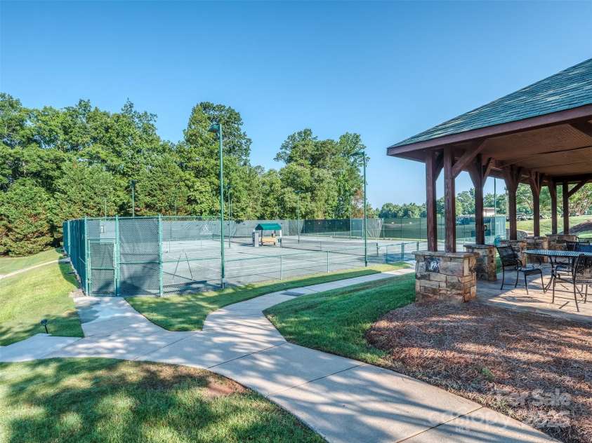 1377 Shinnecock Lane, Fort Mill, SC 29707.  MLS# CAR4273479, YatesRealty ID 31557. Country Club of the Carolinas is a Premiere South Charlotte Private Country Club with Championship 18 Hole Golf Course, Tennis, Olympic Pool, Water Slide, Meeting Space, Fine Dining, Wonderful Vibe, & Multiple Members