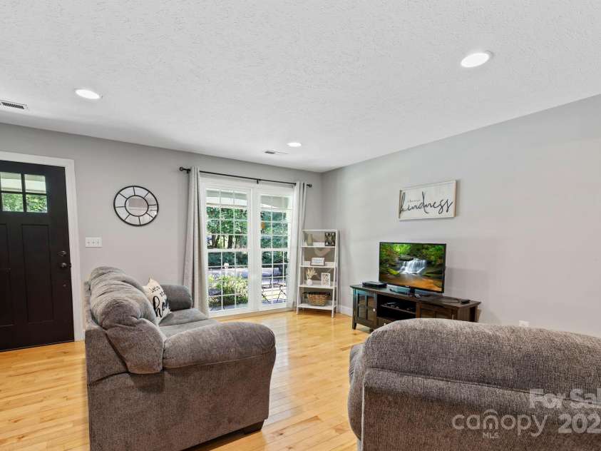 150 Deerwoode Lane, Brevard, NC 28712.  MLS# CAR4257546, YatesRealty ID 31558. Freshly Painted w/ Big Windows