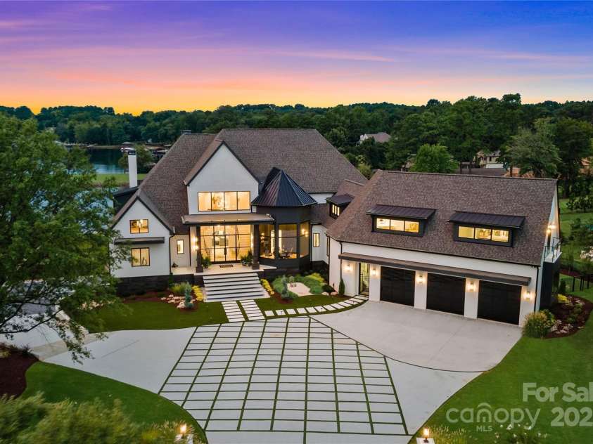 17235 Connor Quay Court, Cornelius, NC 28031.  MLS# CAR4291323, YatesRealty ID 3156. Front Elevation Twilight