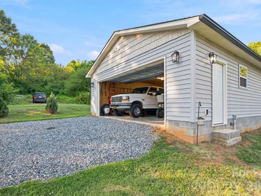 4608 Rainbow Drive, Kannapolis, NC 28081.  MLS# CAR4393962, YatesRealty ID 31562. Side entry door into garage