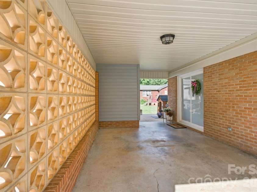 4608 Rainbow Drive, Kannapolis, NC 28081.  MLS# CAR4393962, YatesRealty ID 31562. Well maintained carport