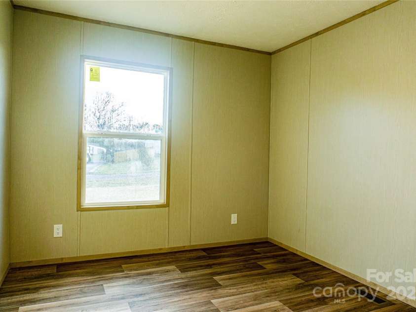 166 Eastgate Drive, Statesville, NC 28625.  MLS# CAR4280738, YatesRealty ID 31563. 