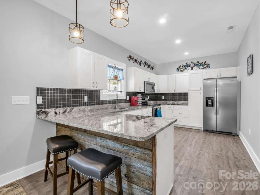 78 Ashley Court, Mill Spring, NC 28756.  MLS# CAR4376253, YatesRealty ID 31564. Open concept wide kitchen