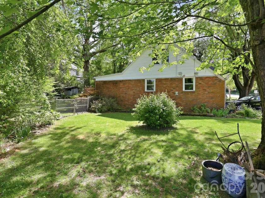 215 Old US 70 Highway, Black Mountain, NC 28711.  MLS# CAR4369511, YatesRealty ID 31565. Side Yard
