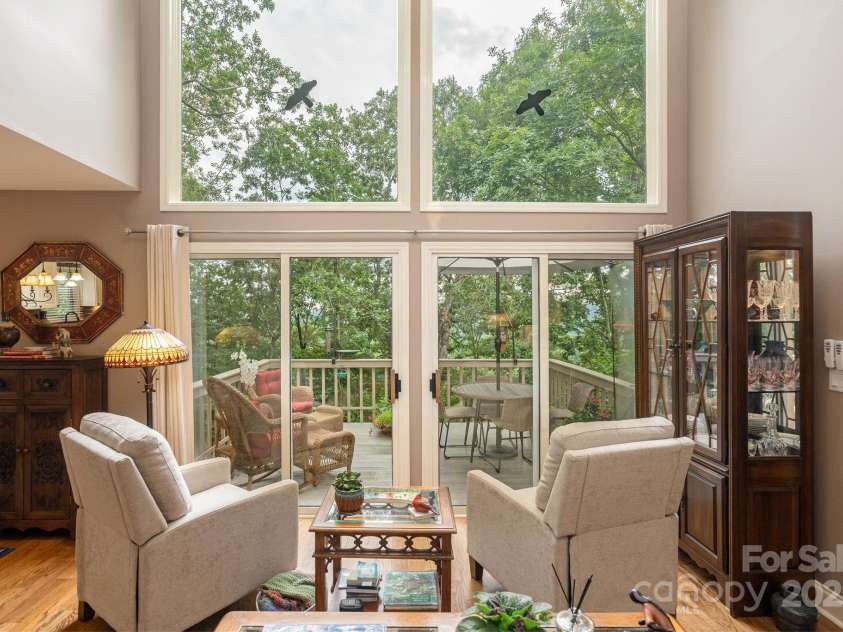 210 Claymoor Court, Flat Rock, NC 28731.  MLS# CAR4289864, YatesRealty ID 31569. A place to sit, relax and enjoy the view