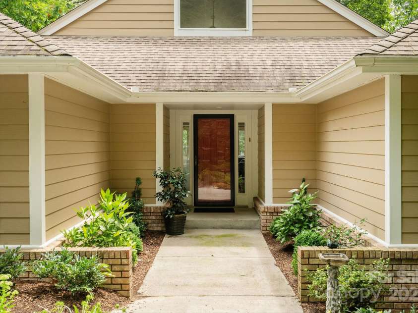 210 Claymoor Court, Flat Rock, NC 28731.  MLS# CAR4289864, YatesRealty ID 31569. An inviting entrance