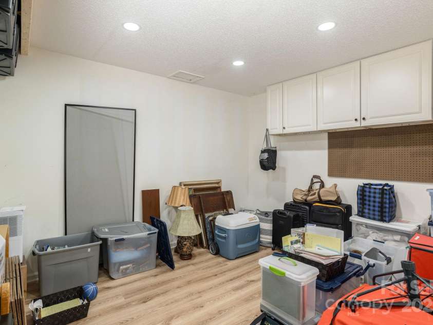 210 Claymoor Court, Flat Rock, NC 28731.  MLS# CAR4289864, YatesRealty ID 31569. Finished storage area with cabinets
