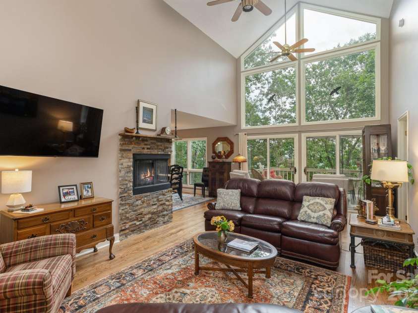 210 Claymoor Court, Flat Rock, NC 28731.  MLS# CAR4289864, YatesRealty ID 31569. Great room with tons of natural light