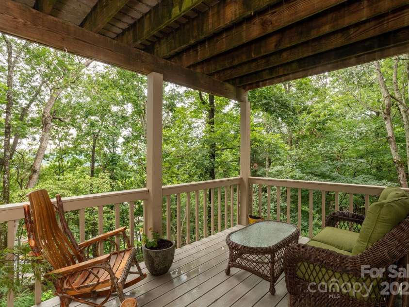 210 Claymoor Court, Flat Rock, NC 28731.  MLS# CAR4289864, YatesRealty ID 31569. Lower level deck off of family room