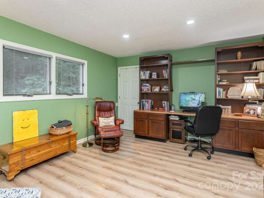 210 Claymoor Court, Flat Rock, NC 28731.  MLS# CAR4289864, YatesRealty ID 31569. Lower level office space with built in desk/shelves
