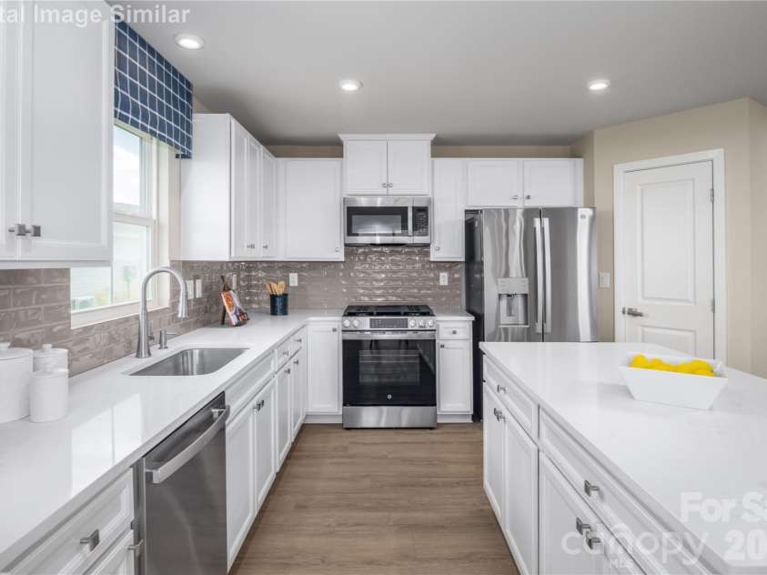 3283 Eller Drive Extension, Hickory, NC 28602.  MLS# CAR4340971, YatesRealty ID 3157. Where Home-Cooked Memories Begin - A True Chef's Delight