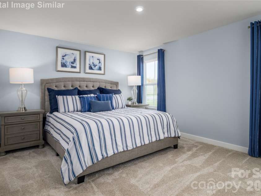 3283 Eller Drive Extension, Hickory, NC 28602.  MLS# CAR4340971, YatesRealty ID 3157. Your private primary haven - windows, warmth, and room to relax.