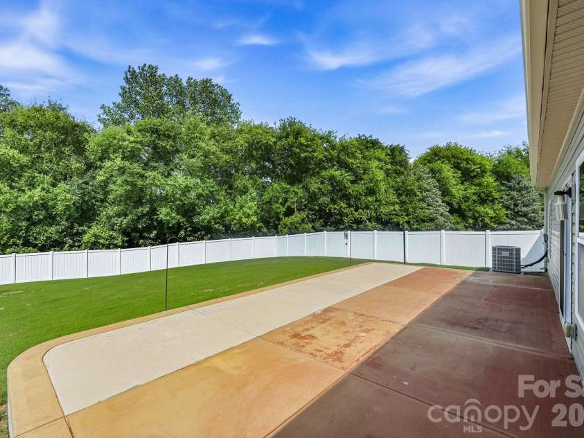 4679 Dunberry Place, Concord, NC 28027.  MLS# CAR4376456, YatesRealty ID 31570. Extensive patio!