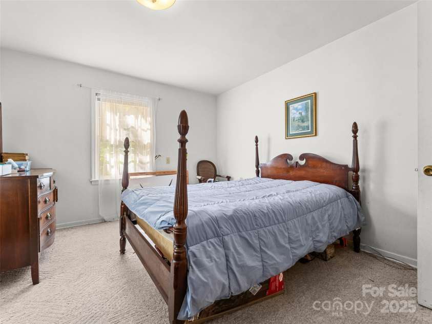 1 Dead End Drive, Flat Rock, NC 28731.  MLS# CAR4285129, YatesRealty ID 31571. Currently used as Bedroom main floor