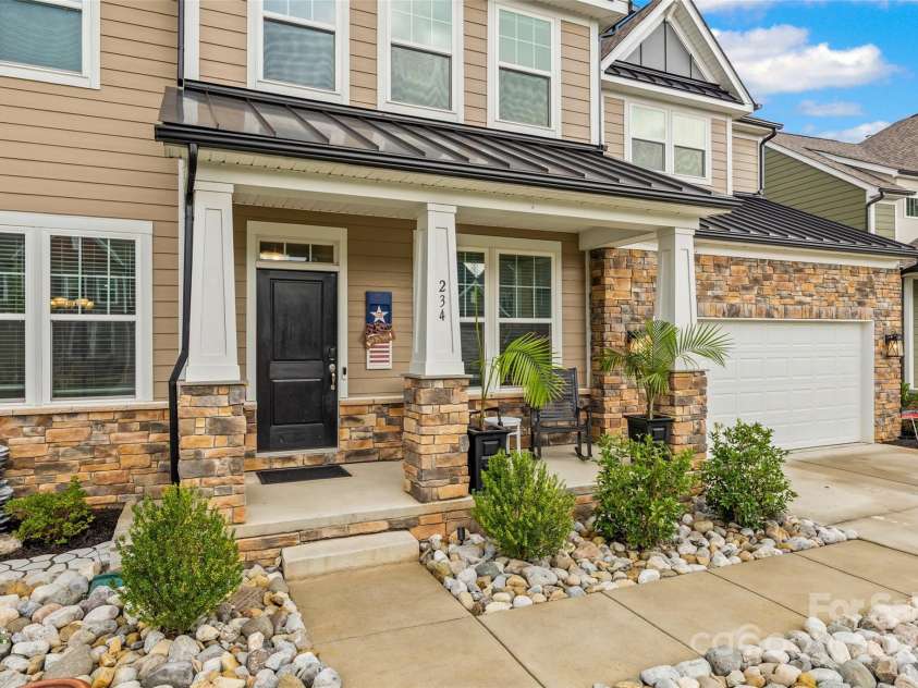 234 Boxelder Road, Clover, SC 29710.  MLS# CAR4288863, YatesRealty ID 31572. Front porch sitting