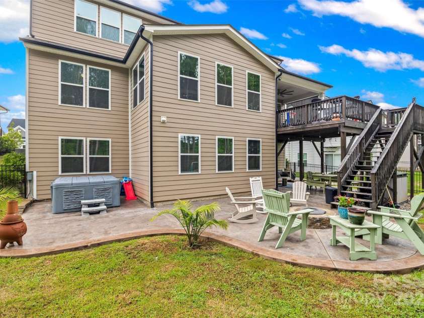 234 Boxelder Road, Clover, SC 29710.  MLS# CAR4288863, YatesRealty ID 31572. Oversized stamped concrete patio with custom fireplace