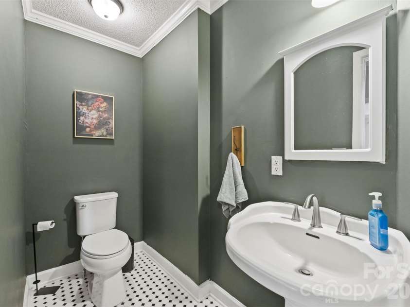 24327 Ridgecrest Road, Locust, NC 28097.  MLS# CAR4393477, YatesRealty ID 31577. 1/2 bath on main level