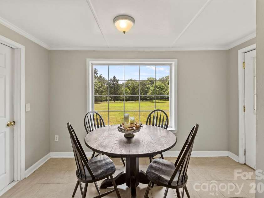 24327 Ridgecrest Road, Locust, NC 28097.  MLS# CAR4393477, YatesRealty ID 31577. Breakfast area