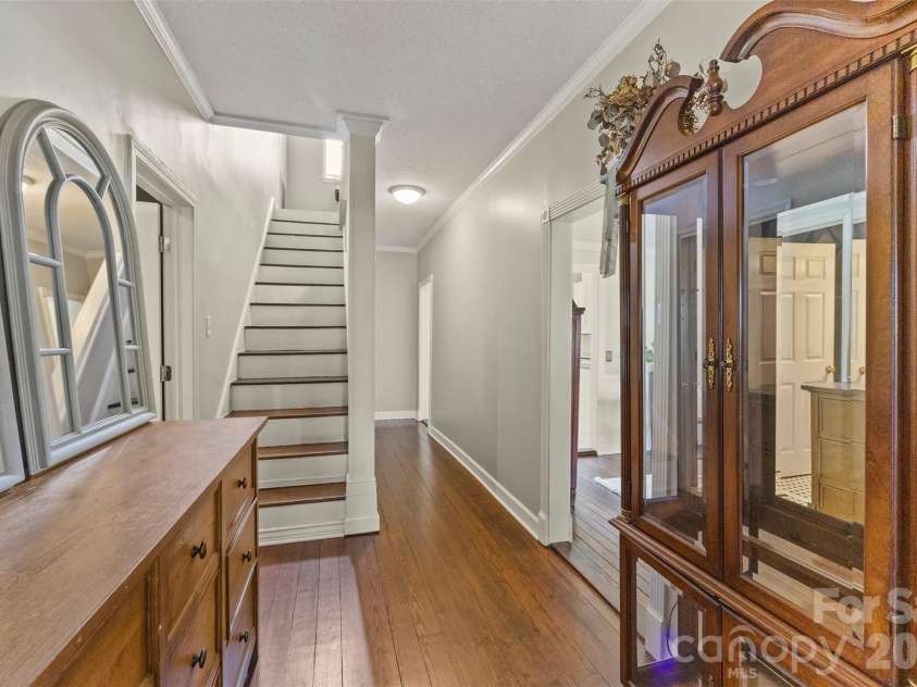 24327 Ridgecrest Road, Locust, NC 28097.  MLS# CAR4393477, YatesRealty ID 31577. Hallway