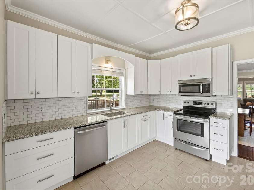 24327 Ridgecrest Road, Locust, NC 28097.  MLS# CAR4393477, YatesRealty ID 31577. Kitchen