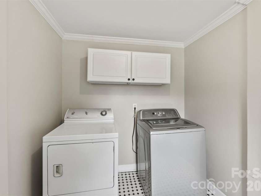 24327 Ridgecrest Road, Locust, NC 28097.  MLS# CAR4393477, YatesRealty ID 31577. Laundry/Utility room